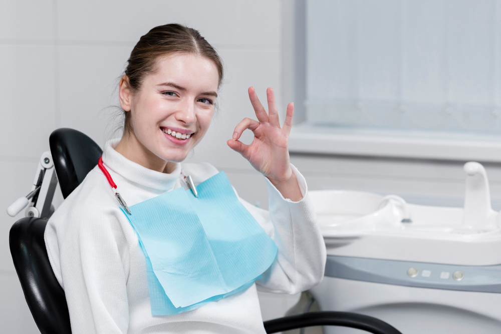Girl at dentist appointment preparing for Invisalign in Denver.