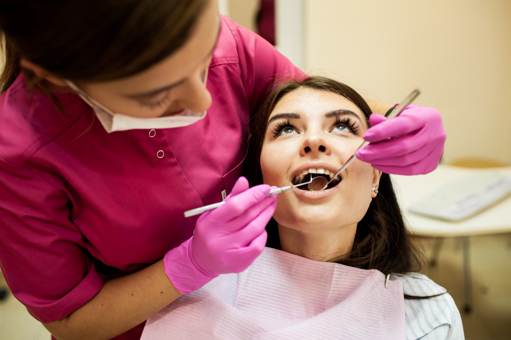 Smiling patient during a Cosmetic Dentistry in Denver consultation.