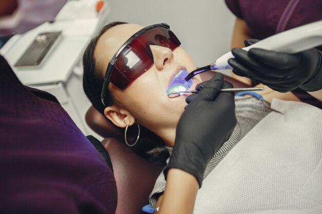 In-office laser procedure used for advanced teeth whitening Denver treatment.
